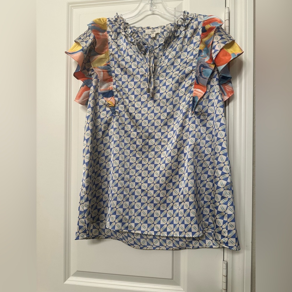 Super cute entro top. NWOT.